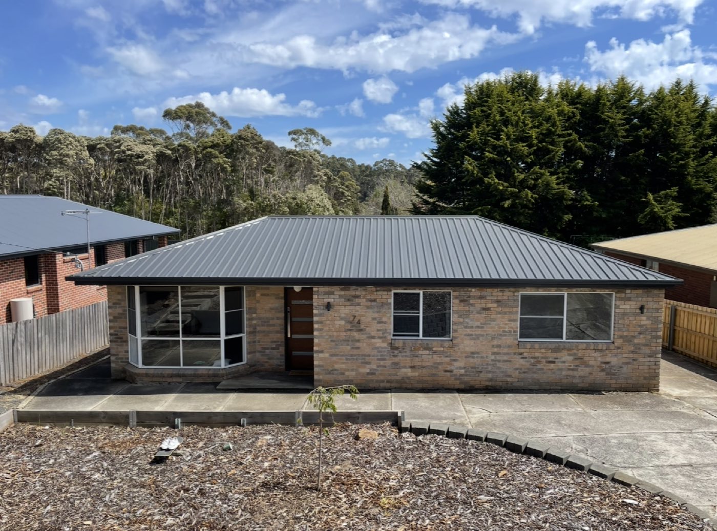 Roof restored with deep charcoal coating