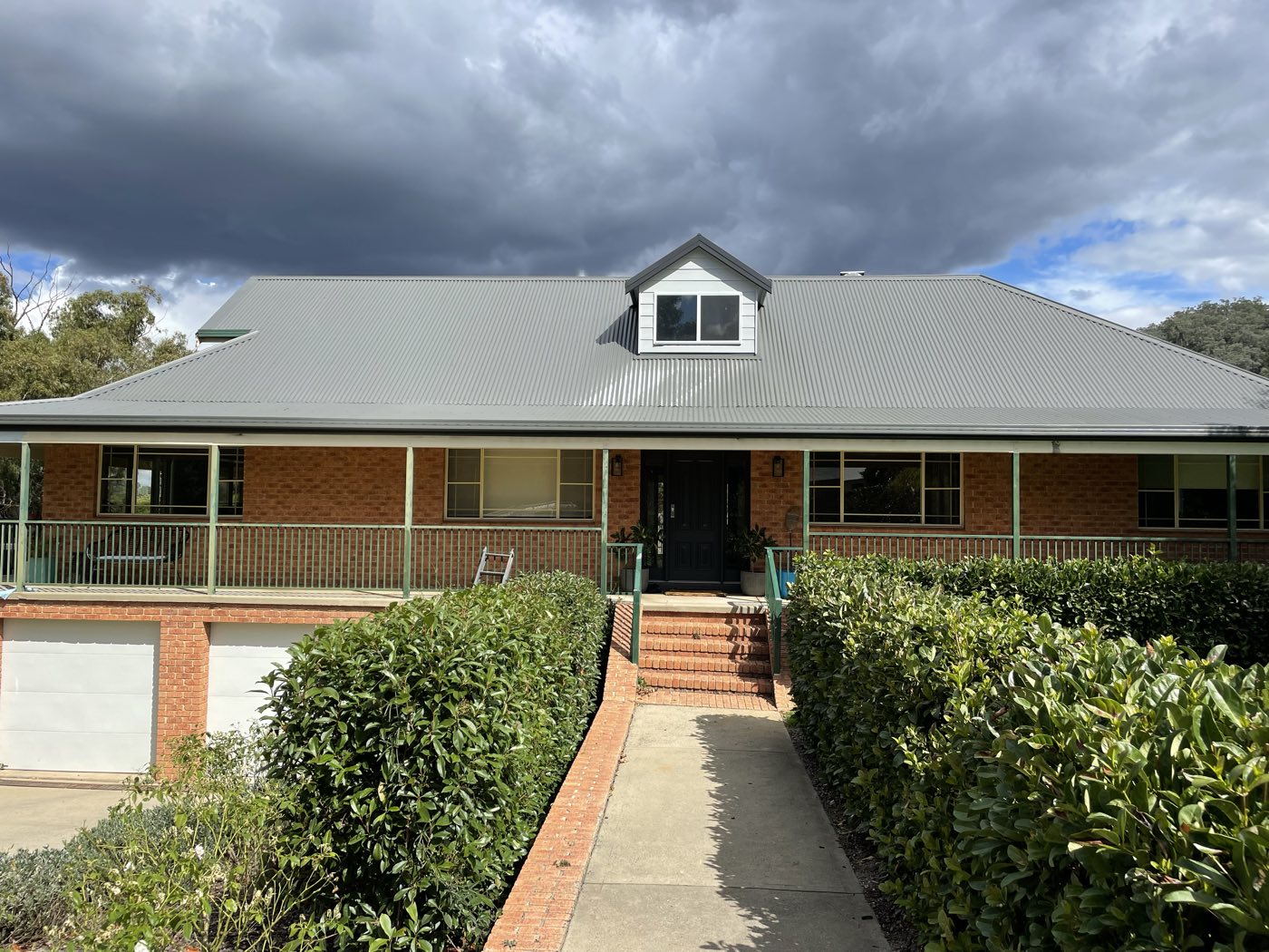 Country roof restored with deep green coating