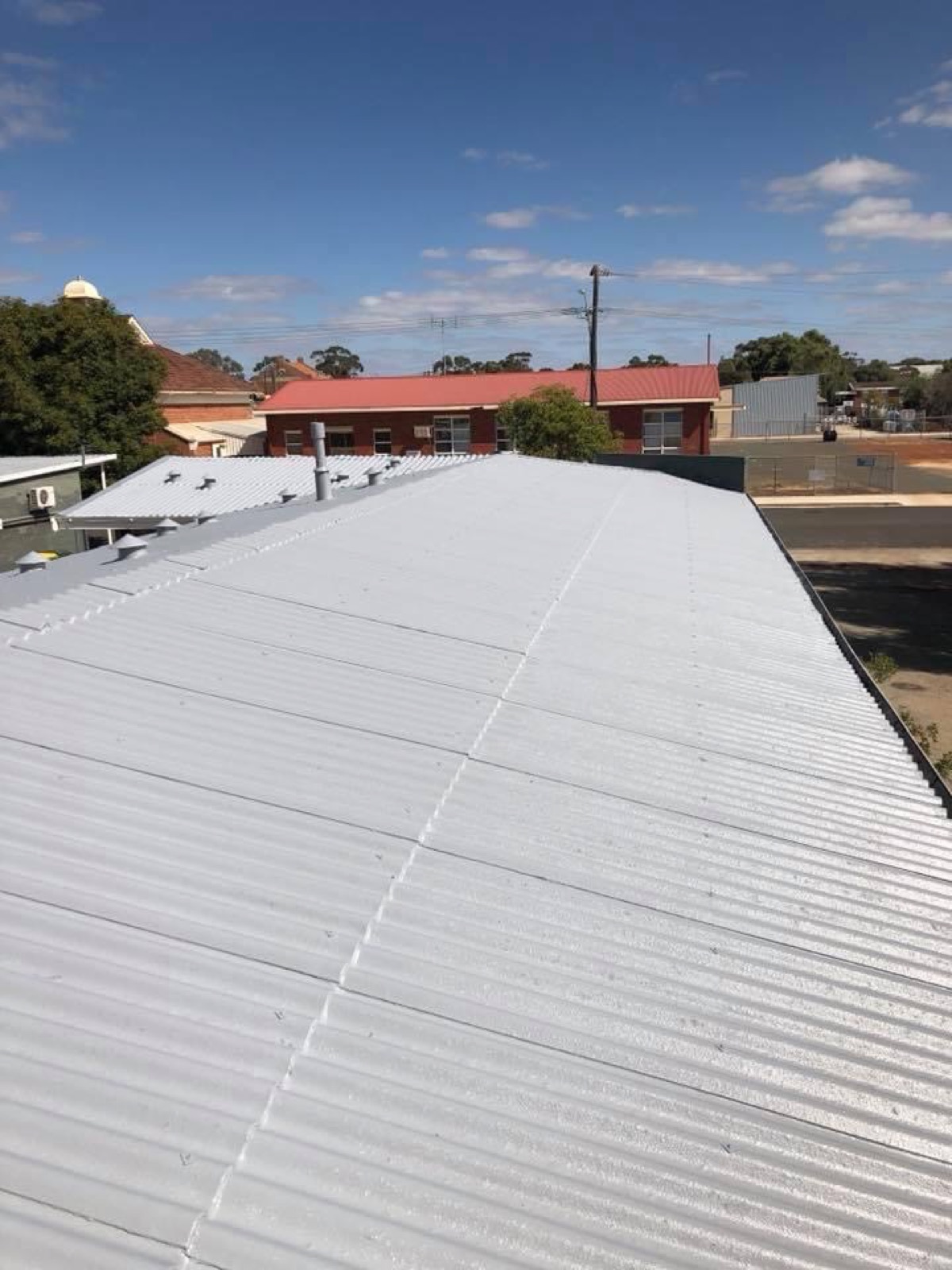 Roof restored to a bright white finish